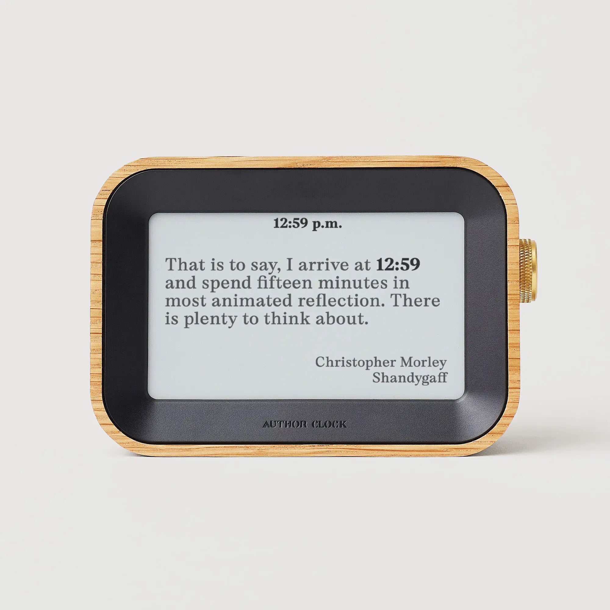 Author Clock Vol 1 Small showing a Christopher Morley quote from Shandygaff at 12:59 p.m. on its e-paper screen