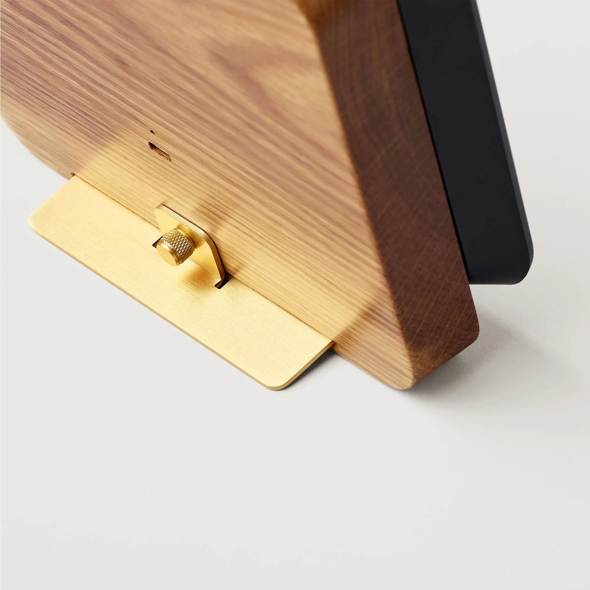 Rear view of the Author Forecast showing its brass stand and oak body.