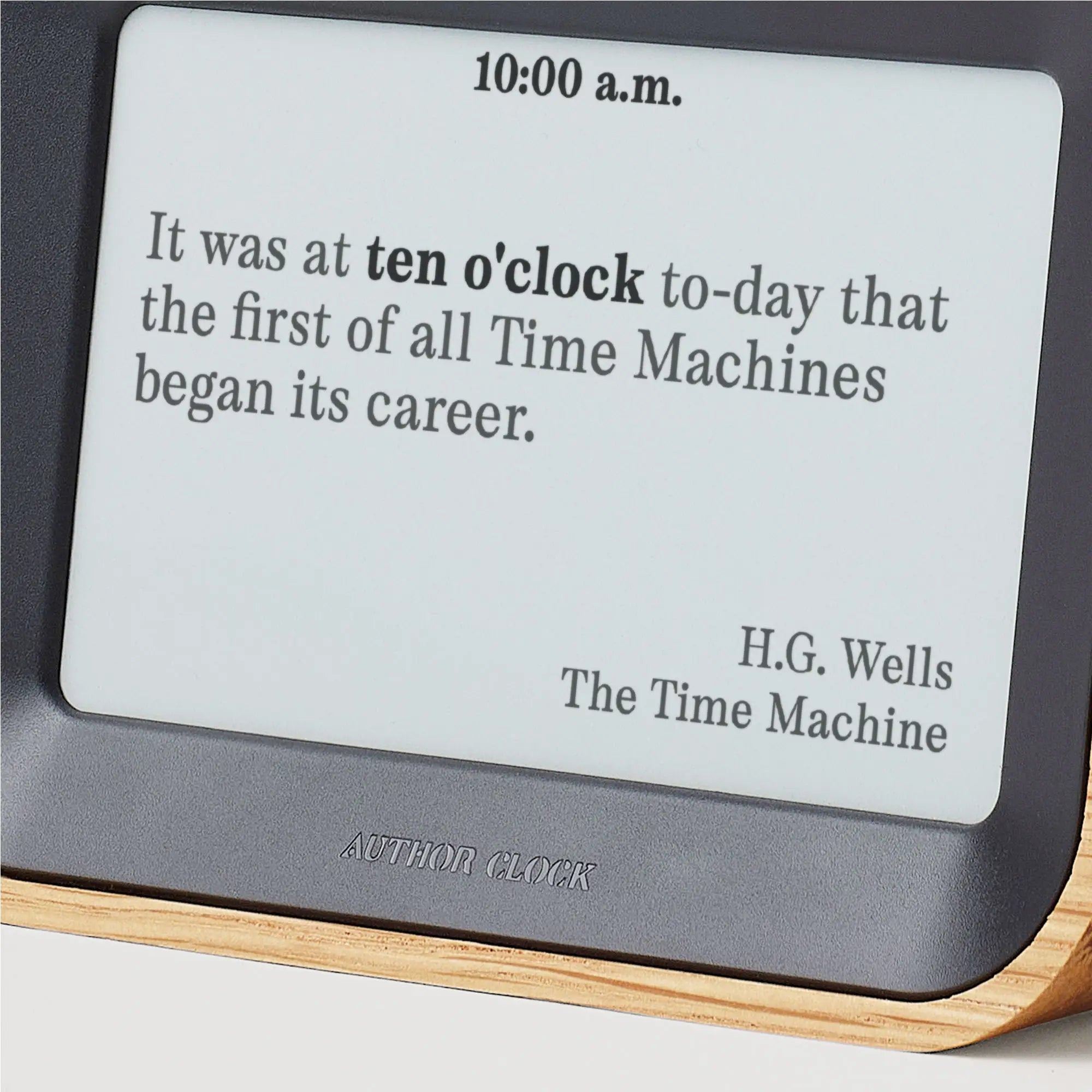 Detailed close-up of the Author Clock e-paper screen displaying literary quote
